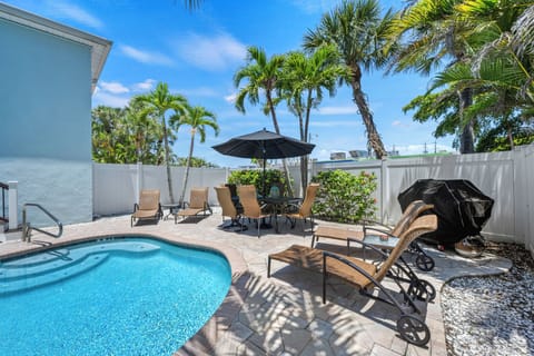 The private backyard is your group's go-to for downtime and BBQs.