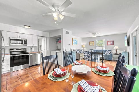 Holmes Hideaway dining area with a view of the kitchen and living room.
