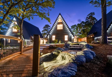 Walk this charming boardwalk to reach your very own A-frame—part modern retreat, part storybook escape.