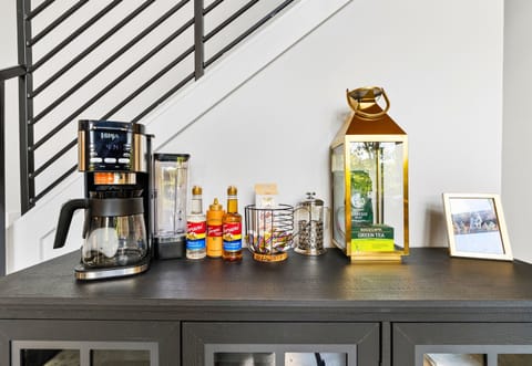 This coffee and cocktail station is stocked and ready to fuel your mornings or kick off happy hour in style.