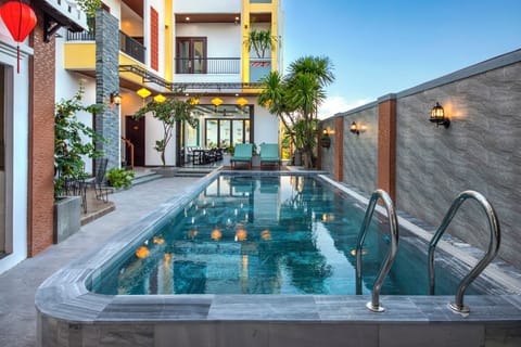 Outdoor pool, open 8:00 AM to 8:00 PM, pool umbrellas, sun loungers