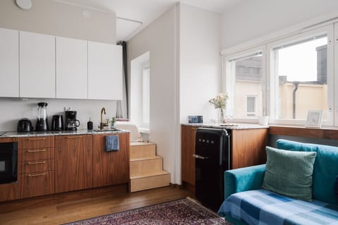 The spacious living room is perfect for relaxing after a long day of exploring the city.