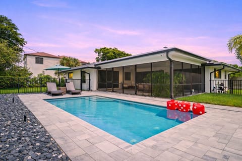 Sleek modern living with a private pool made for sunshine, relaxation, and a little fun. 🌊☀️🎲