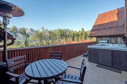 Deck - Large heated deck with hot tub, BBQ grill and table with seating for 4