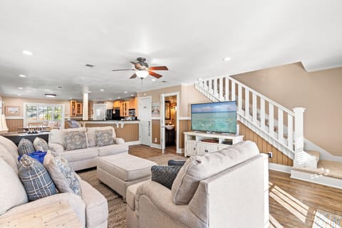 Townhome, Multiple Beds, Patio, Garden View (5808 Beach Drive A) | Living area | 42-inch flat-screen TV with digital channels