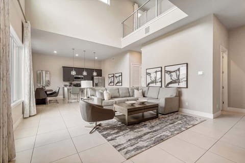 Stay in this elegant, open-concept loft with soaring ceilings and chic décor. Enjoy a fully equipped kitchen, cozy living area, and serene views. Perfectly located near top attractions, dining, and entertainment. Relax in style—book your getaway now!
