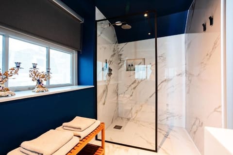 Superior Double Room, City View | Bathroom | Shower, hair dryer, towels, soap