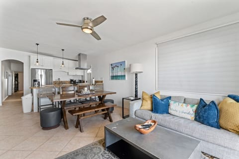 Spacious living and dining area with a coastal, relaxed ambiance.