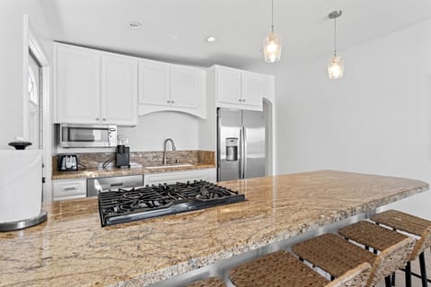 Open-concept kitchen with a spacious island