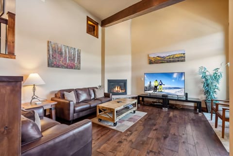 Living room: Main floor, gas fireplace, Smart TV, balcony access