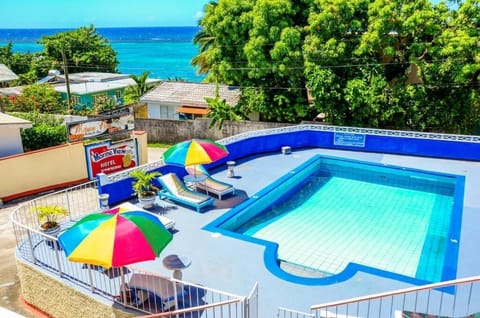Outdoor pool, open 9:00 AM to 6:00 PM, sun loungers