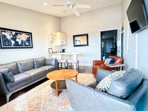 Club Suite, 1 King Bed, Hot Tub | Living area | LED TV