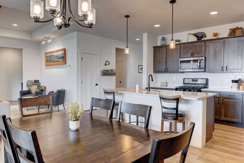 Dining Room: The 6 seater dining area offering a picturesque view, enhancing the dining experience.