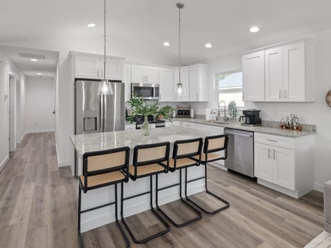 Sleek design meets functionality in this modern dining area – a stylish space to dine and unwind.