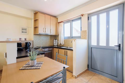 Kitchen Access with Door to the Balcony and Outdoor Airflow

