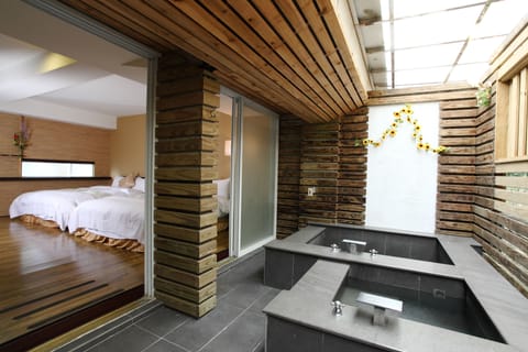 Family Room | Bathroom | Combined shower/tub, spring water tub, hair dryer, slippers