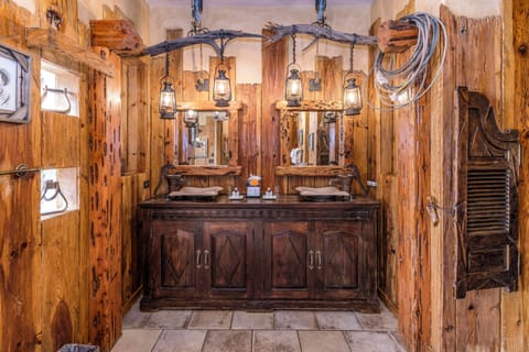 Separate tub and shower, jetted tub, designer toiletries, bathrobes