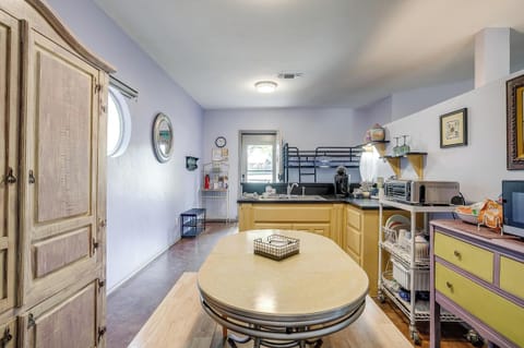 Kitchen is fully stocked with dishes, utensils, and cooking basics for your convenience.