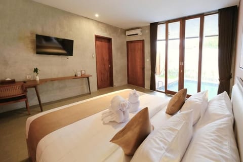 Villa, 1 Bedroom, Private Pool | Minibar, desk, laptop workspace, blackout drapes