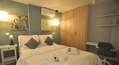 Superior Apartment, City View | 1 bedroom, blackout drapes, iron/ironing board, free WiFi