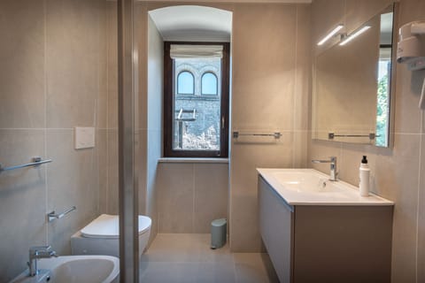 Triple Room, City View | Bathroom | Shower, free toiletries, hair dryer, towels