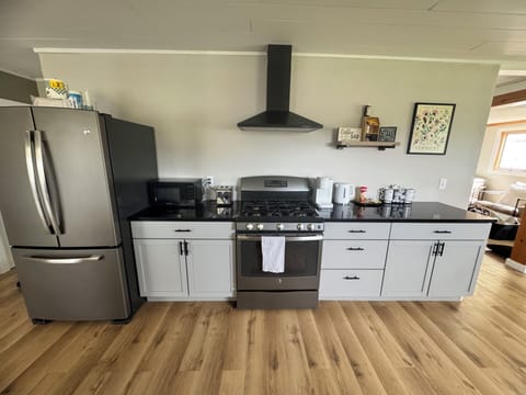 Full size refrigerator and freezer, microwave, gas oven