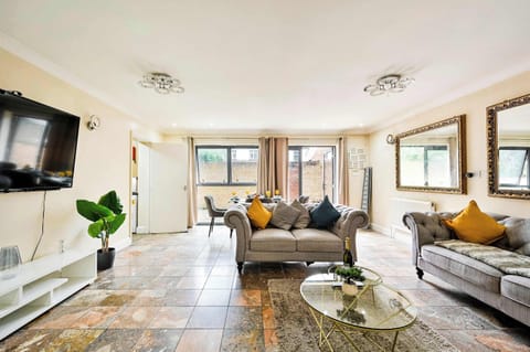 Bright, airy living space with Smart TV — your home base after a long day in London