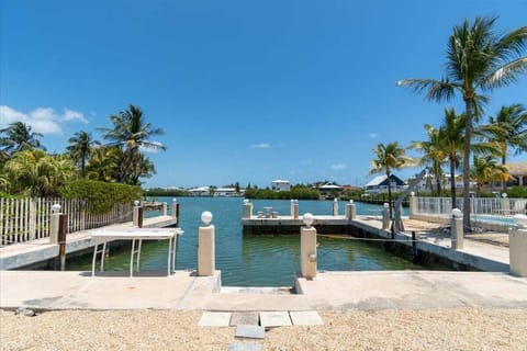 Enjoy peace of mind with protected, secure boat docking at this waterfront home in Marathon, Florida Keys.