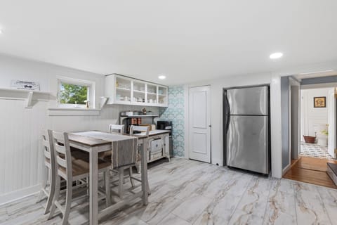 Open Kitchen With Stainless Steal Refrigerator With Ice