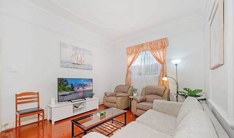 Comfortable sofa and TV