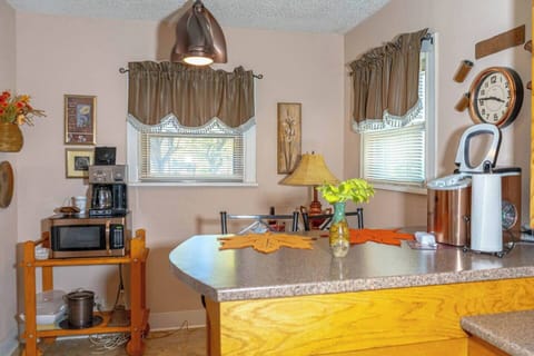 Coffee bar stocked with creamers & sweeteners, start your day right.