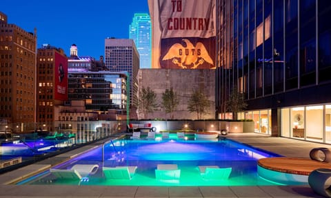 Outdoor pool, open 8:00 AM to 10:00 PM, sun loungers