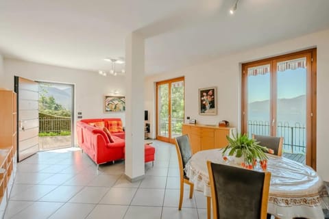 Apartment, Multiple Beds, Patio, Mountain View (Sopra il Lago 4) | Living area | 42-inch flat-screen TV with digital channels