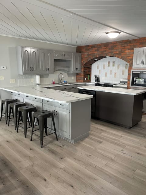 Eat-in kitchen with large island. Seating for 4 at the island.kit