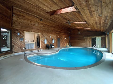 Large indoor, heated poo. Walk in at 3 feet deep and gradually gets to 6 feet.