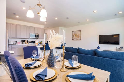 Enjoy meals together at the dining table, with seating for 7