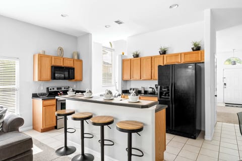 Fully Equipped Kitchen, featuring bar counter with seating for 4