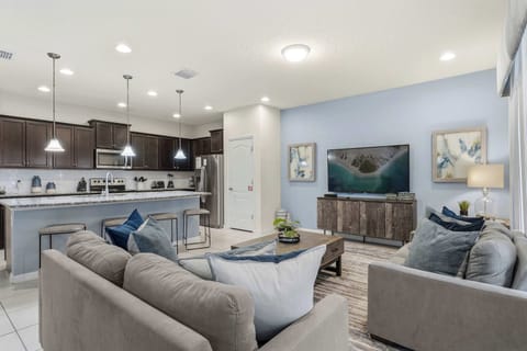 A cozy living room, stream your favorites on the smart TV & patio access