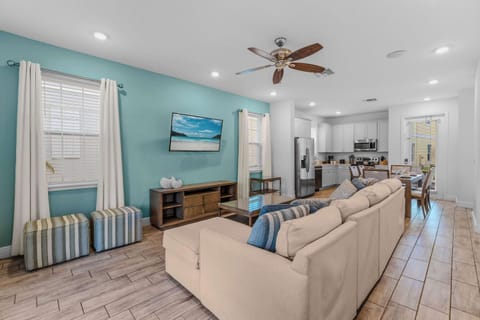 Curl up in the coastal living room & stream all your favorite entertainment