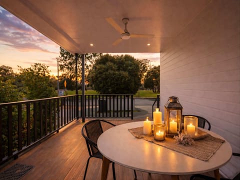Covered Outdoor Balcony with Seating – Rosslea Townsville Holiday Accommodation