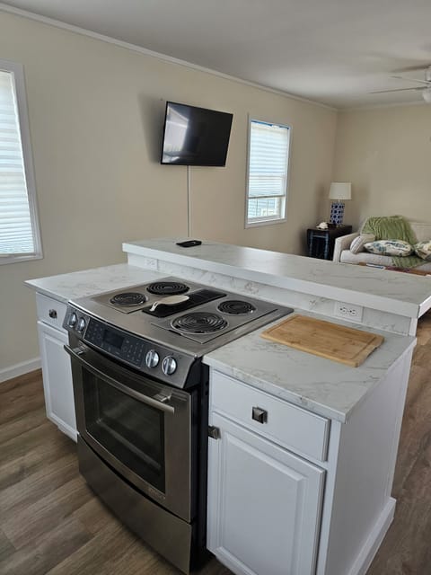 open concept den and kitchen