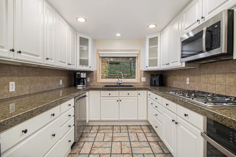 Cook, dine, and relax in this spacious kitchen.