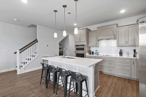 Kitchen with island seating for four