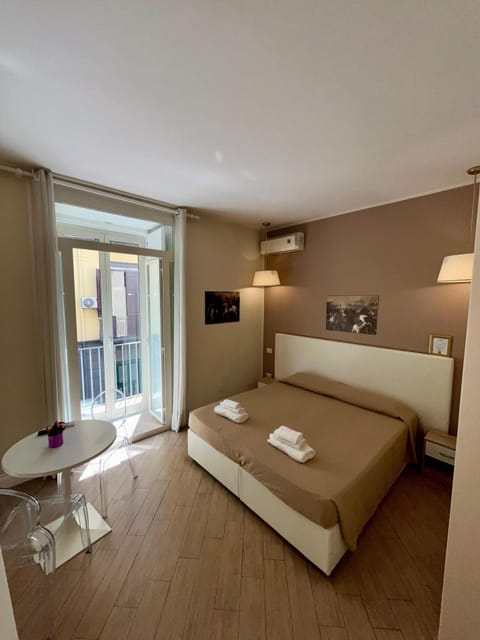 Deluxe Double or Twin Room, Balcony, City View | Premium bedding, desk, laptop workspace, free WiFi