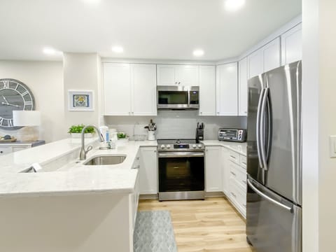 Villa, Multiple Beds, Kitchen (1835 Beachside Tennis) | Private kitchen | Coffee/tea maker, dining tables