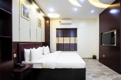 Economy Room, Balcony, City View | Desk, laptop workspace, blackout drapes, soundproofing