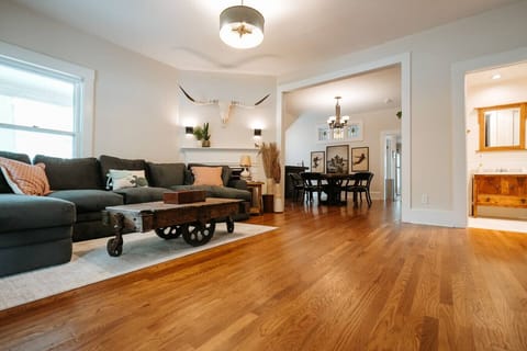 Massive living room with a comfy couch and large screen tv