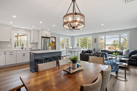 Cook, dine, and relax together in this beautiful open-concept area