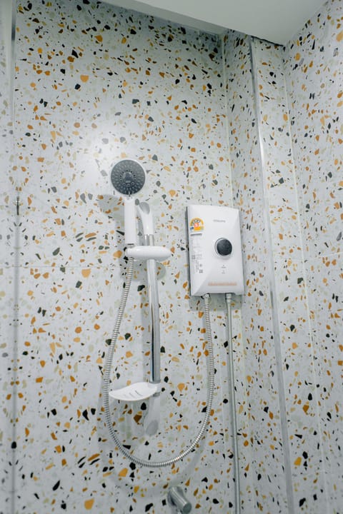 Shower, free toiletries, hair dryer, slippers