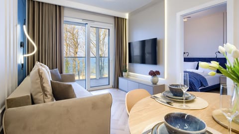 Apartament (218) with sea view | Living area | Flat-screen TV